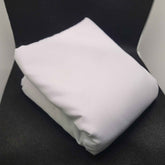 A folded white garment displayed on a dark background, possibly representing the product 'Plain Hazuriye'.