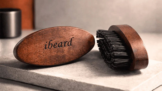 Sikh man's well-maintained full beard, with a quality wooden comb and beard brush displayed alongside